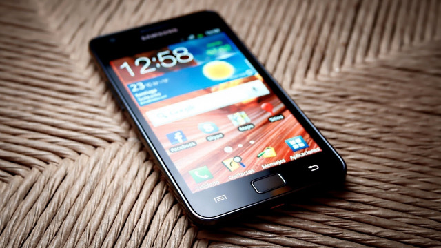 Cellphone table brown wicker photorealism free wallpaper for desktop - medium preview image