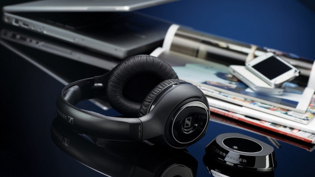 Headphones table laptop magazine cellphone free wallpaper for desktop - medium preview image