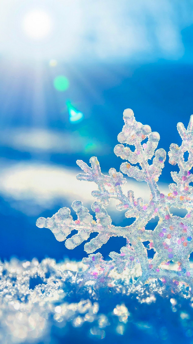 Snowflake blue background bright sun free wallpaper for mobile - medium preview image