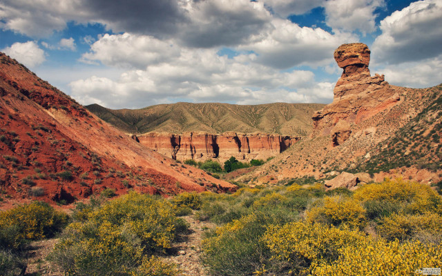 Rocky landscape mountain clouds sky free wallpaper for desktop - medium preview image