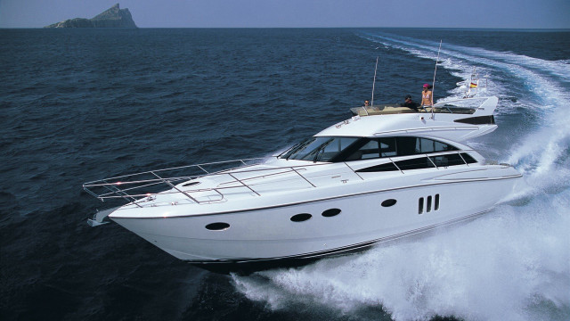 White boat water rock person free wallpaper for desktop - medium preview image