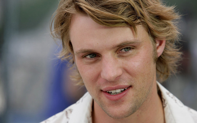 Man white shirt smiling camera free wallpaper for desktop - medium preview image