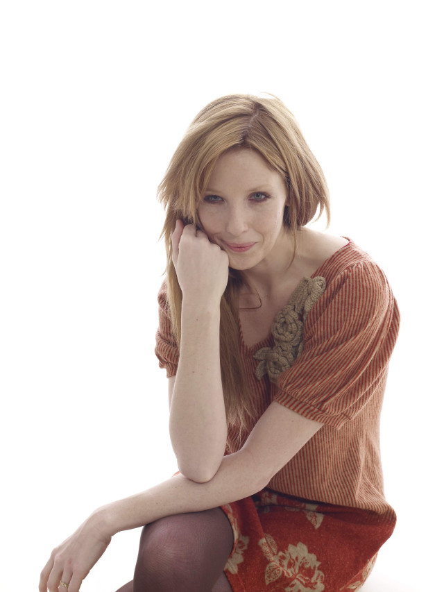 Woman sitting ground hand face free wallpaper for mobile - medium preview image