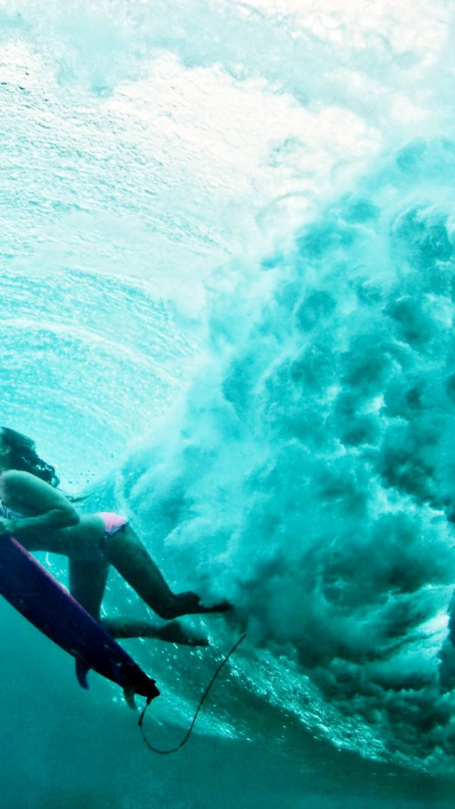 Woman surfing ocean wave helmet free wallpaper for mobile - medium preview image