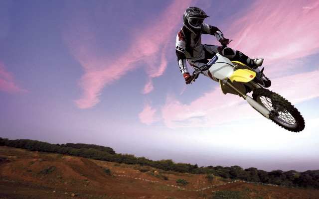 Man motorcycle air trick yellow free wallpaper for desktop - medium preview image