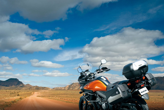 Motorcycle dirt road desert mountains free wallpaper for desktop - medium preview image