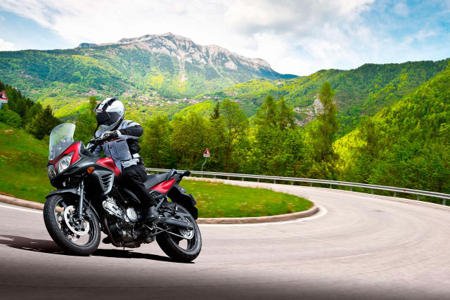 Motorcycle winding road mountains ride free wallpaper for desktop - medium preview image
