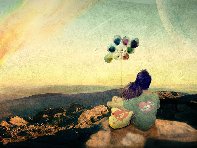 Woman sitting rock rainbow balloons free wallpaper for desktop - medium preview image