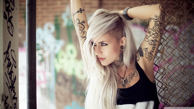 Tattooed woman white hair fence free wallpaper for desktop - medium preview image