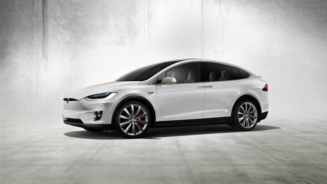 White tesla electric car concrete #2 free wallpaper for desktop - medium preview image