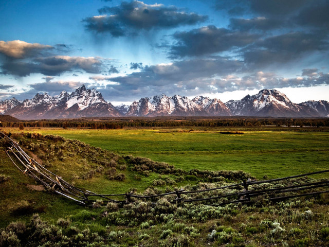 Fence field mountains clouds sky free wallpaper for desktop - medium preview image