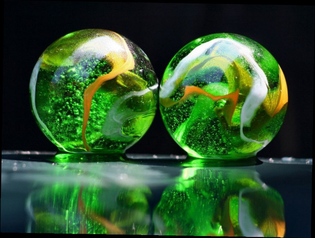 Green glass balls reflection tabletop #6 free wallpaper for desktop - medium preview image