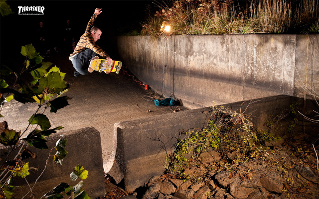 Man skateboarding cement ramp night free wallpaper for desktop - medium preview image