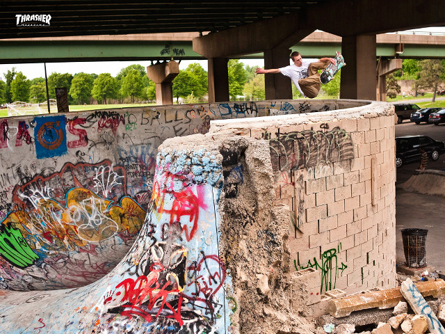 Man skateboarding cement ramp graffiti free wallpaper for desktop - medium preview image
