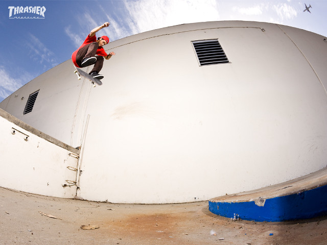 Man skateboard white building blue free wallpaper for desktop - medium preview image