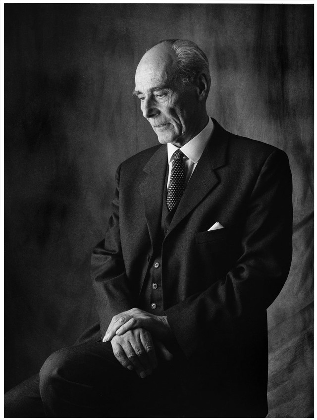 Bald man suit tie portrait free wallpaper for mobile - medium preview image