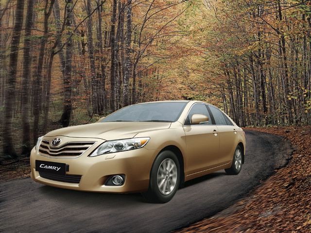 Gold toyota car driving woods free wallpaper for desktop - medium preview image