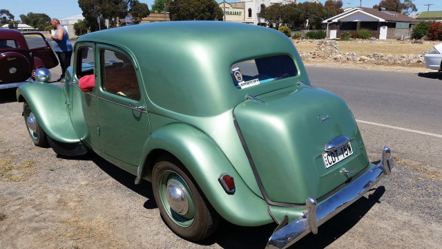 Green car red car person free wallpaper for desktop - medium preview image