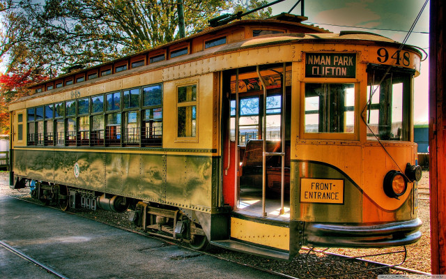 Trolley car parked tracks station free wallpaper for desktop - medium preview image