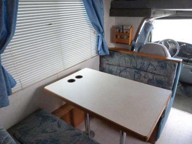 Table couch small room window free wallpaper for desktop - medium preview image