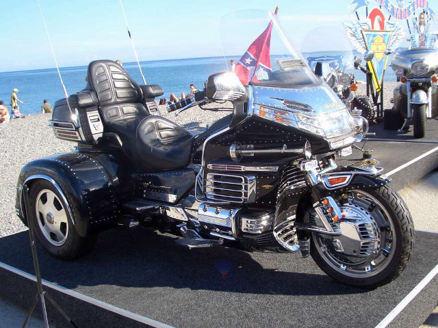 Motorcycle parked ocean road people free wallpaper for desktop - medium preview image