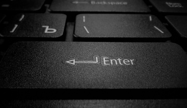 Close up keyboard enter button free wallpaper for desktop - medium preview image