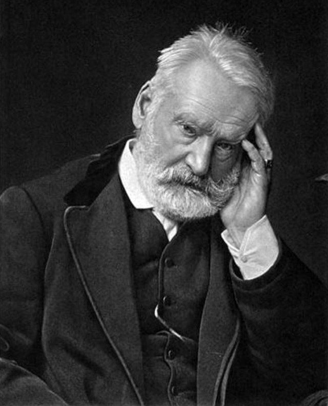 Man beard suit sitting hand free wallpaper for mobile - medium preview image