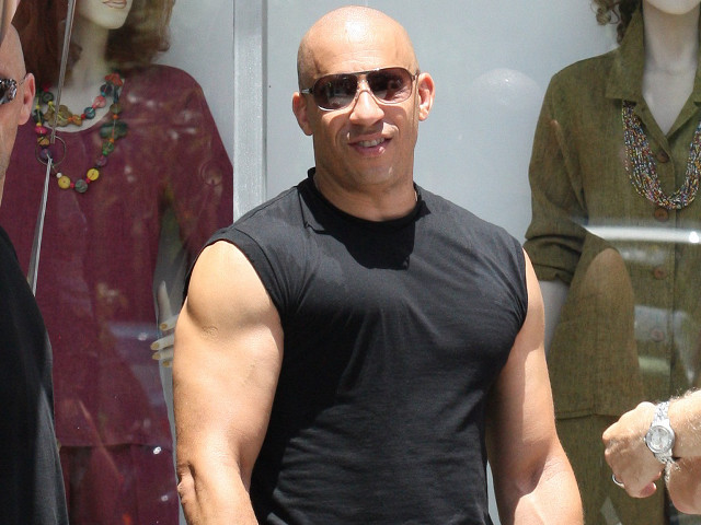 Bald man black shirt sunglasses #2 free wallpaper for desktop - medium preview image