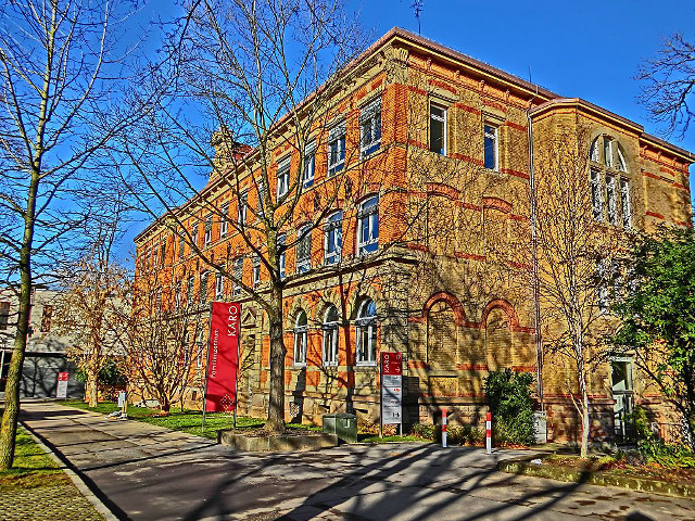 Large brick building red door free wallpaper for desktop - medium preview image