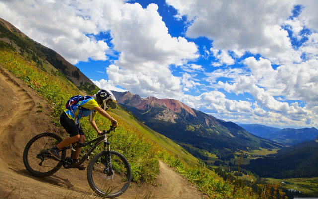 Mountain bike dirt road cloudy free wallpaper for desktop - medium preview image