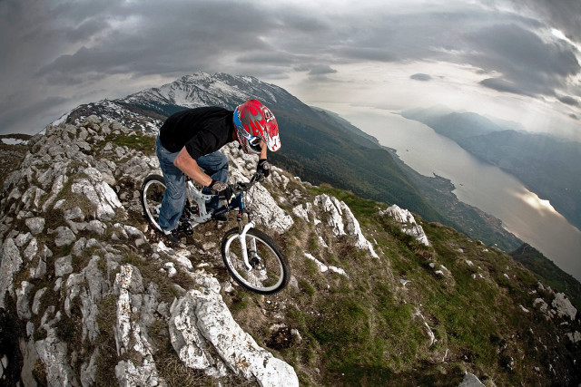 Man riding bike rocky mountain free wallpaper for desktop - medium preview image