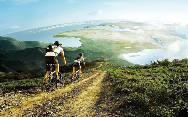 Couple biking dirt road lake #2 free wallpaper for desktop - medium preview image