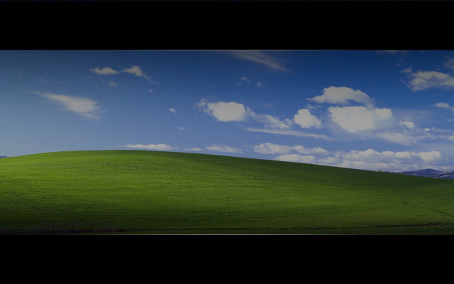 Green hill blue sky clouds free wallpaper for desktop - medium preview image