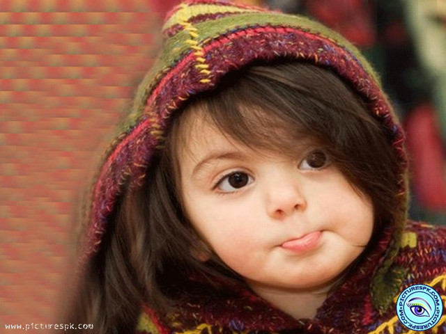 Little girl colorful jacket smiling free wallpaper for desktop - medium preview image