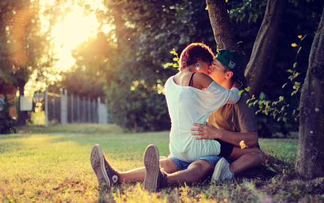 Man woman hugging grass tree #3 free wallpaper for desktop - medium preview image