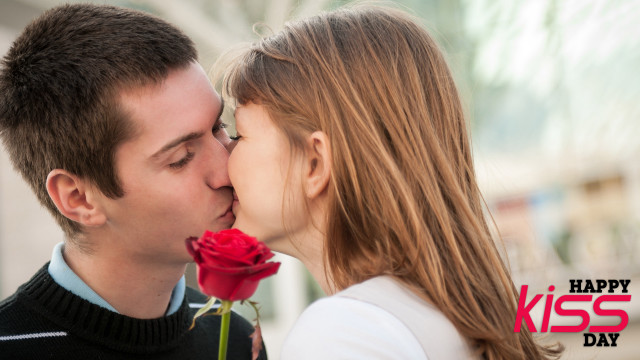 Man kissing woman red rose free wallpaper for desktop - medium preview image