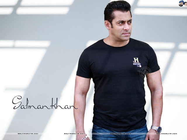 Man black shirt white wall #2 free wallpaper for desktop - medium preview image