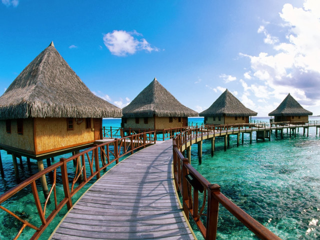 Wooden walkway pier thatched huts free wallpaper for desktop - medium preview image