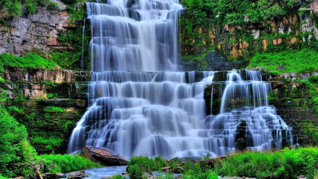 Waterfall cascading water lush green free wallpaper for desktop - medium preview image
