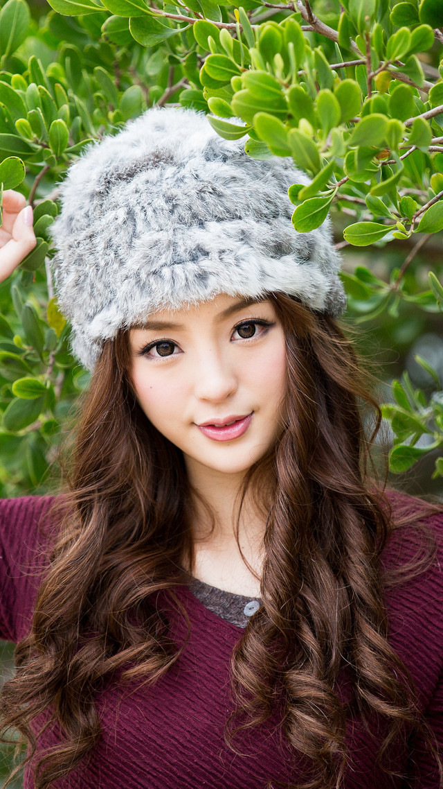 Young woman hat fur lined free wallpaper for mobile - medium preview image