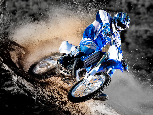 Man riding dirt bike muddy free wallpaper for desktop - medium preview image