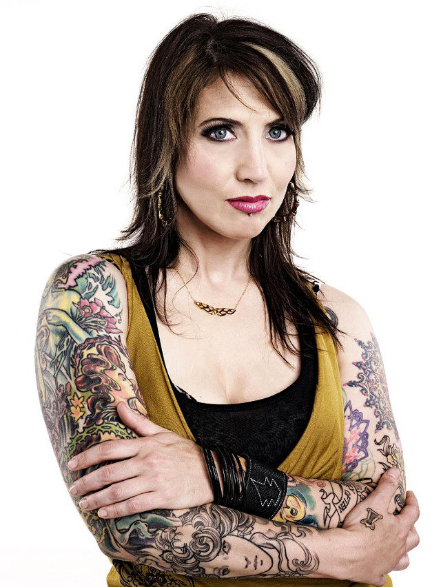 Woman tattoos arms chest posing free wallpaper for mobile - medium preview image