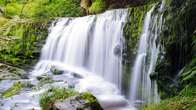 Waterfall lush green trees rocks free wallpaper for desktop - medium preview image