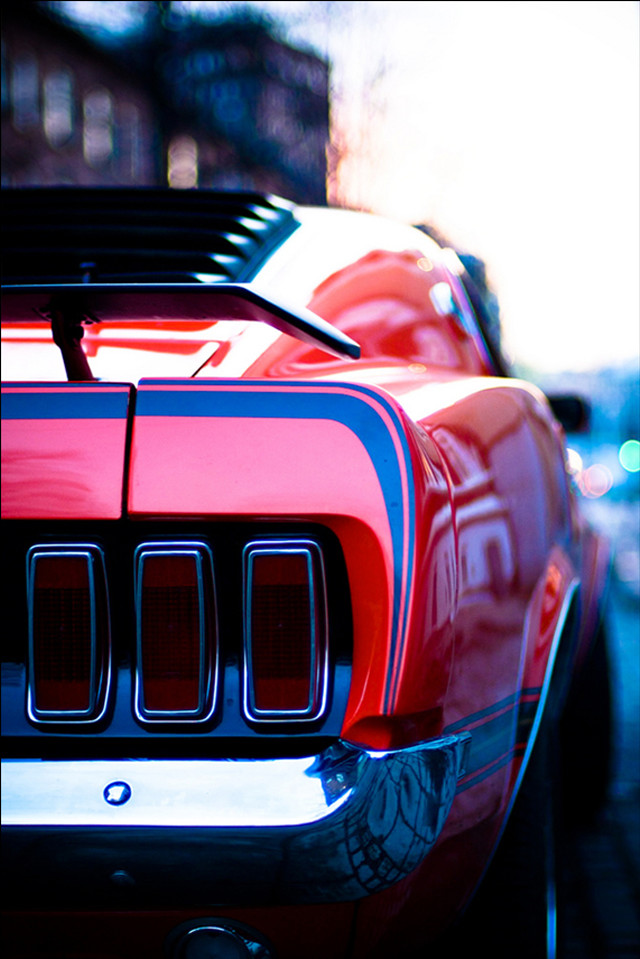 Red sports car parked side free wallpaper for mobile - medium preview image
