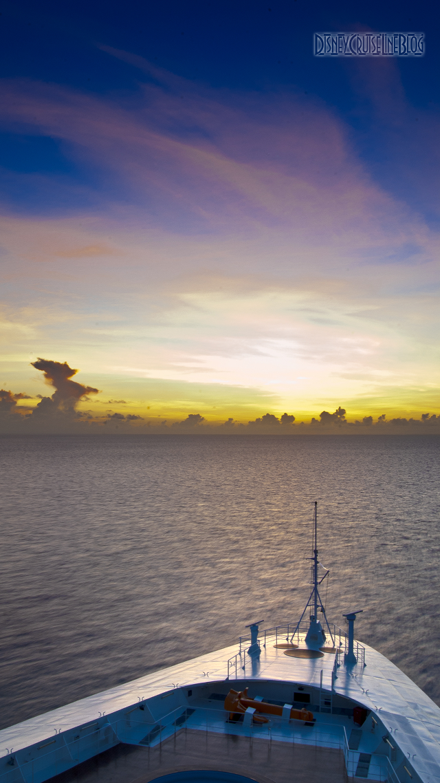 Boat sunset water orange blue free wallpaper for mobile - medium preview image