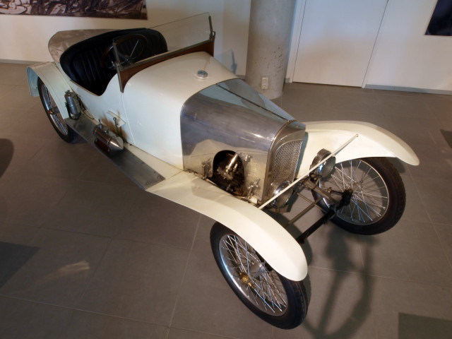 White car museum display futurism free wallpaper for desktop - medium preview image