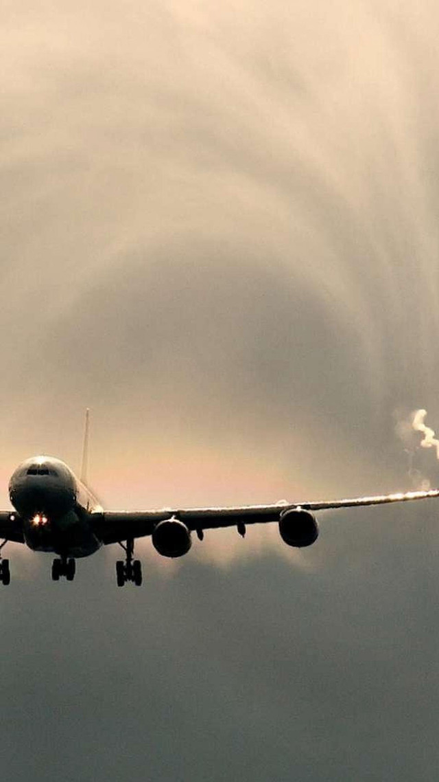 Jetliner cloudy sky smoke tail free wallpaper for mobile - medium preview image