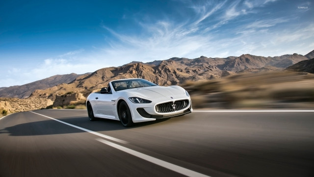 White sports car mountain road #4 free wallpaper for desktop - medium preview image