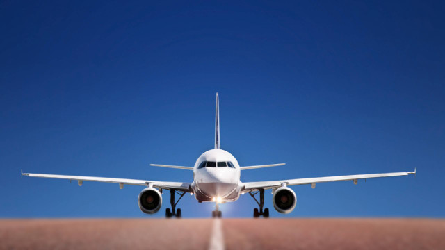 Jetliner flying blue sky runway #6 free wallpaper for desktop - medium preview image