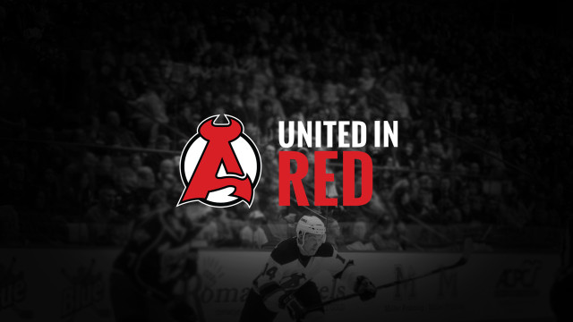 Hockey player united red background free wallpaper for desktop - medium preview image